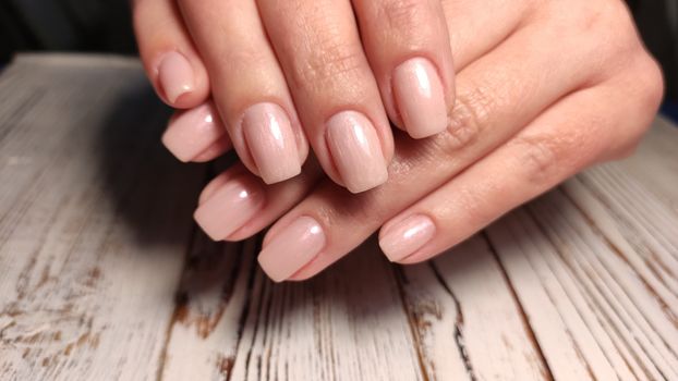 gel lacquer manicure on a textured trendy background