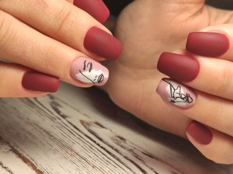 Autumn manicure. Beautyful nails design with autumn leaves. Top view. cozy autumn image.