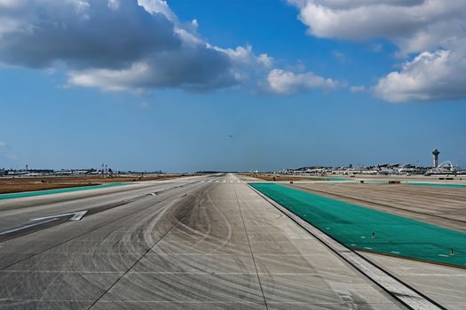 Empthy Runway at Major Airport under Nice Sky