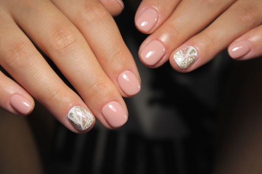 glamorous beautiful manicure on a trendy texture background