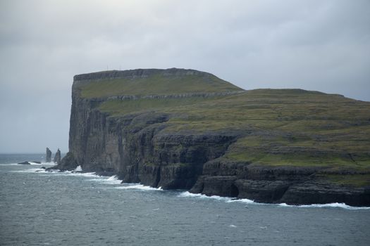 Sea stacks Risin and Kellingin a view from tjornuvik, Faroe Islands