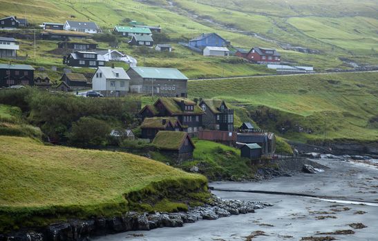 Typical faroe houses with grassy roofs in the villafe of Leynar, Faroe Islands