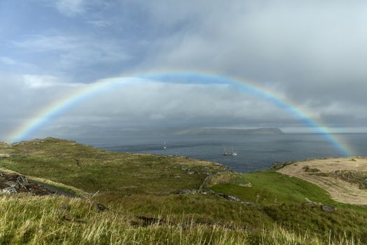 Landscape of Faroe Islands showing rainbow