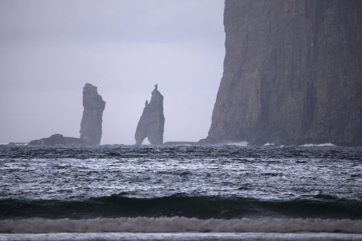 Sea stacks Risin and Kellingin a view from tjornuvik, Faroe Islands