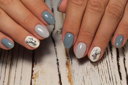 glamorous beautiful manicure on a trendy texture