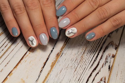 fashion manicure with a design on a beautiful texture