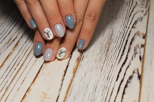 glamorous beautiful manicure on a trendy texture