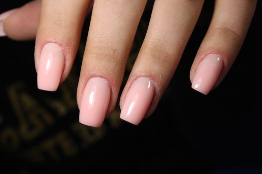 glamorous beautiful manicure on a trendy texture background