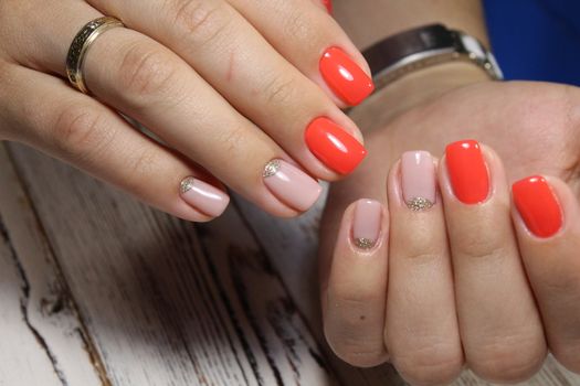 Sexual pink manicure on beautiful female hands