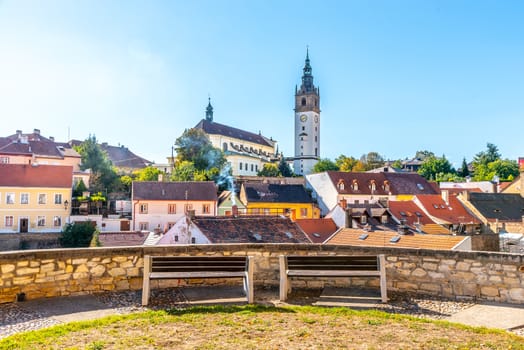 Litomerice cityscape with baroque St. Stephen's Cathedral and bell tower, Litomerice, Czech Republic. View from fortification walls and baileys.