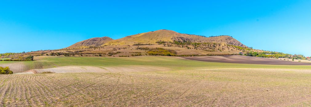 Rana Mountain near Louny in Central Bohemian Highlands on sunny summer day, Czech Republic. Panoramic view.