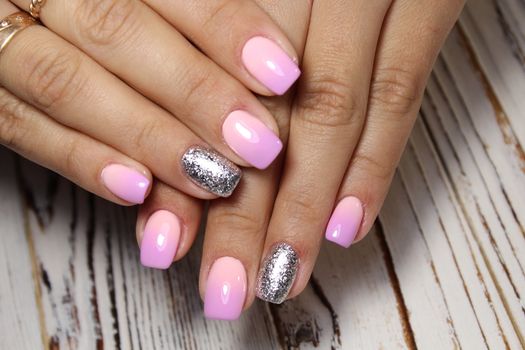 glamorous beautiful manicure on a trendy texture background