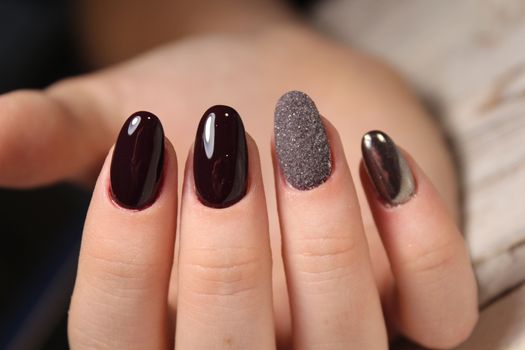 Stylish manicure nails color black and silver