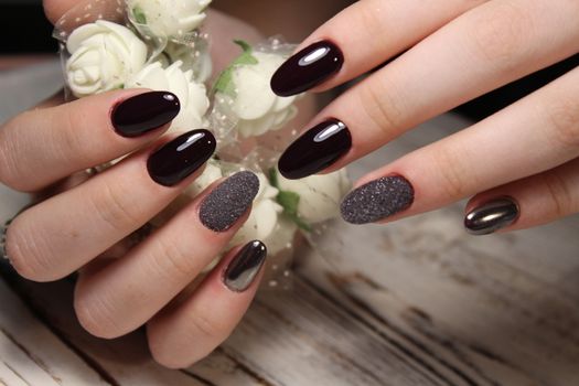 glamorous beautiful manicure on a trendy texture background