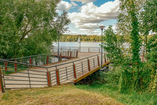 Empty dock in calm lake Jaziorak in Poland