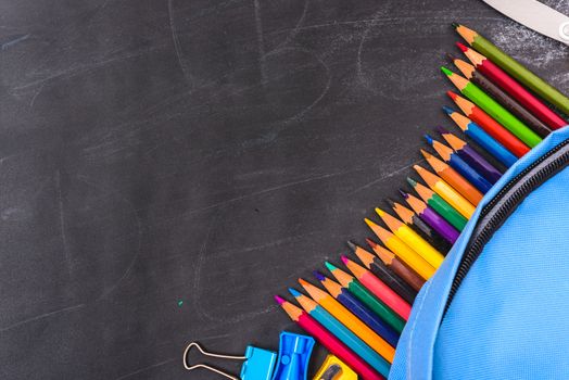 Back to school shopping backpack, The Accessories in student blue bag on blackboard background and have chalkboard also