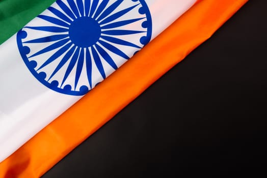 Indian republic day, flat lay top view, Indian flag on black background with copy space for your text