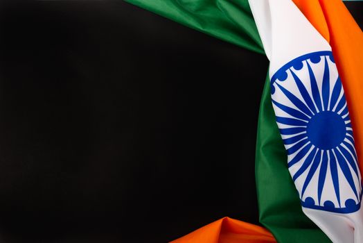 Indian republic day, flat lay top view, Indian flag on black background with copy space for your text