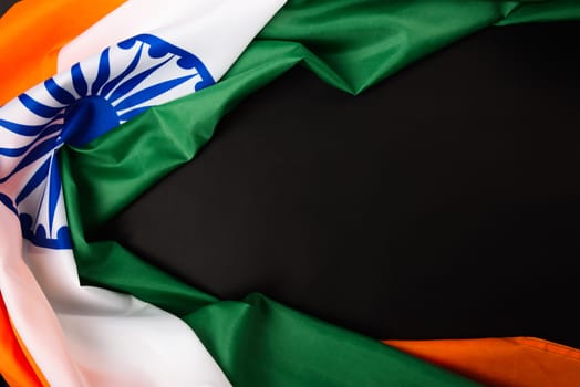 Indian republic day, flat lay top view, Indian flag on black background with copy space for your text