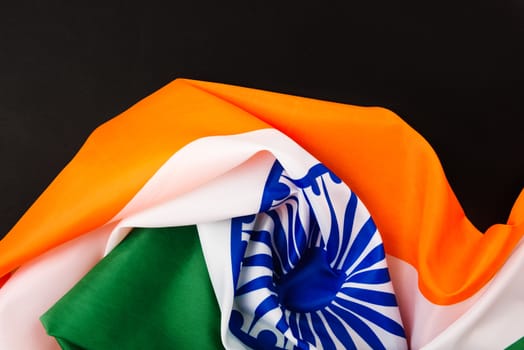 Indian republic day, flat lay top view, Indian flag on black background with copy space for your text