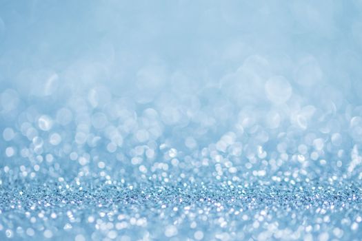 Blue twinkling lights bokeh light background Christmas new year design