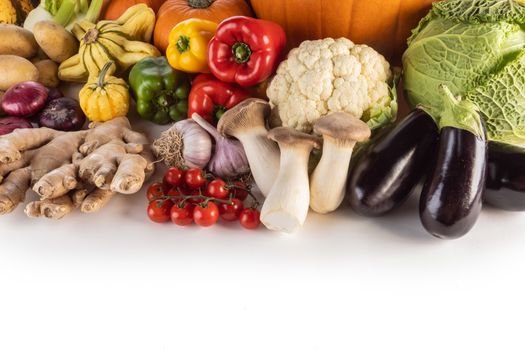 Harvest of many vegetables isolated on white background border frame with copy space for text