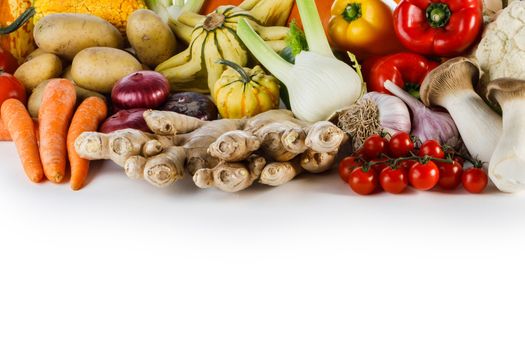 Harvest of many vegetables isolated on white background border frame with copy space for text