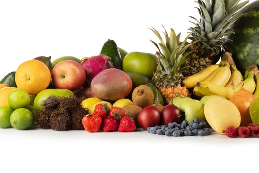 Fresh tropical fruits harvest pile isolated on white background with copy space for text