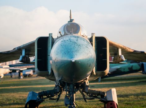 old army military combat fighter aircraft at the airport close up