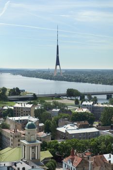 Riga tv tower on a bright sunny day with the city