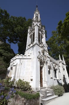 Chapel in Quinta da Regaleira on a bright sunny day.