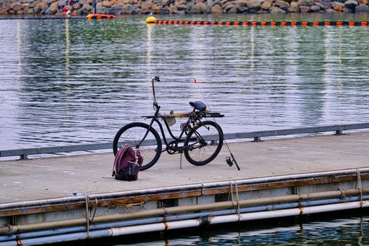 Fishing Gear and Bike on a Pier