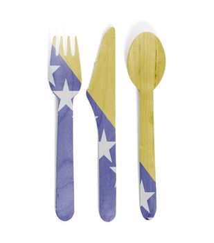 Eco friendly wooden cutlery - Plastic free concept - Isolated - Flag of Bosnia Herzegovina