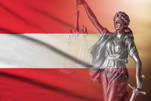 Statue of a blindfolded Justice holding scales and a sword over the flag of Austria in a conceptual image
