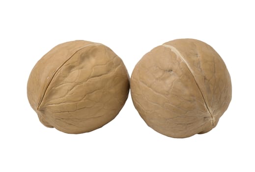 Delicious whole walnuts, isolated on white background.
