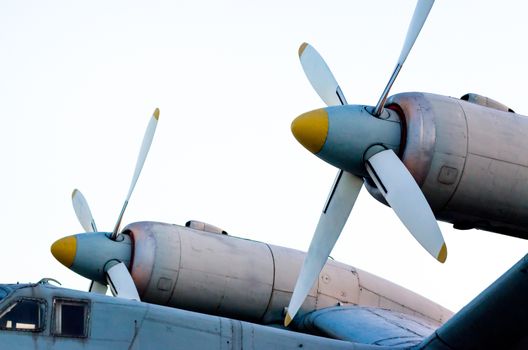 propeller engine of an old vintage airplane on a white background isolated closeup