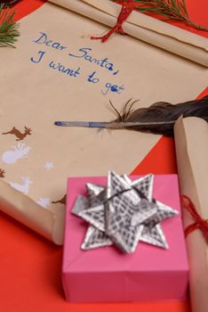Empty letter for Santa Claus. Copy space. Red background
