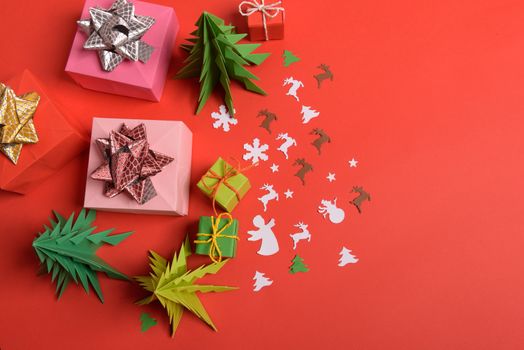 Christmas or New Year background, plain composition made of Xmas decorations and fir branches, flat lay, blank space for a greeting text.