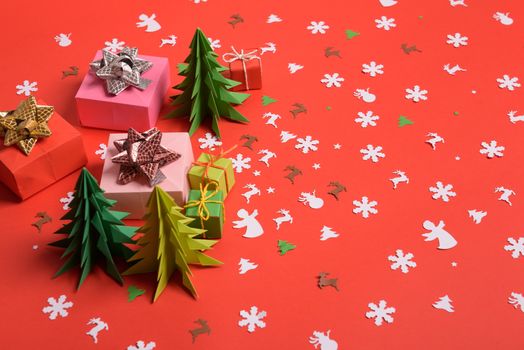 Christmas or New Year background, plain composition made of Xmas decorations and fir branches, flat lay, blank space for a greeting text.