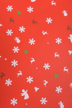 Christmas or New Year background, plain composition made of Xmas decorations and fir branches, flat lay, blank space for a greeting text.