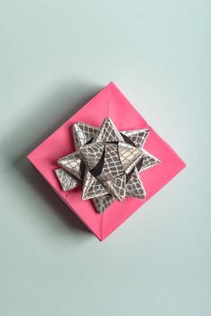 christmas presents nicely decorated with bows and feathers. view from above