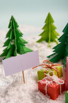 christmas presents nicely decorated with bows and feathers. view from above