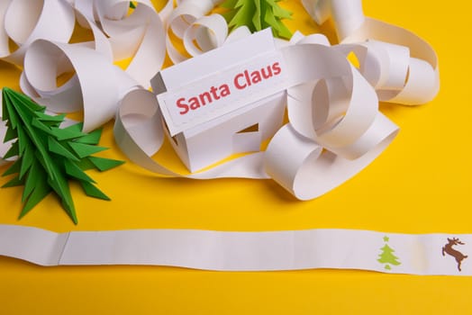 Long twisted expanded empty letter. Copy space. yellow background. View from above