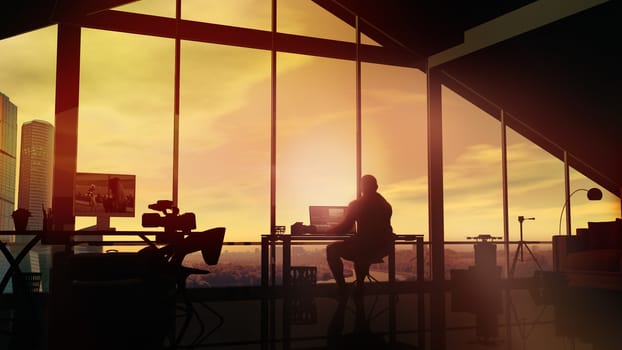 Against the backdrop of a bright sunset, a videographer is working in his office.