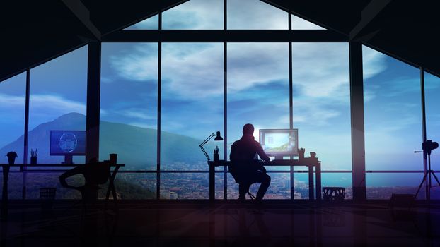 A photographer sits in his office in front of a panoramic window in the evening.