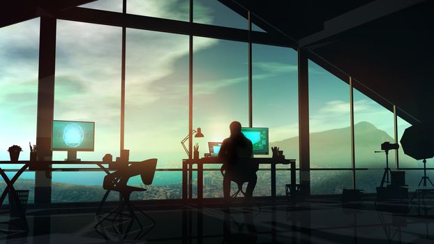 Silhouette of a photographer sitting at a computer in front of panoramic windows overlooking the coast.