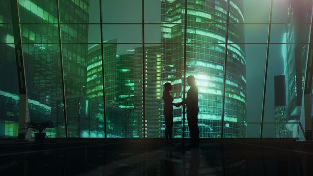 In an office lit by a green light, silhouettes of man and woman shaking hands.
