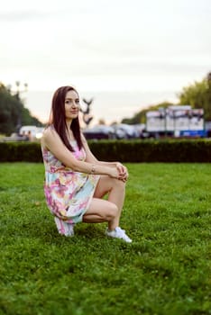 Autumn attractive woman portrait smiling outdoors at the park. Authentic and natural photographs