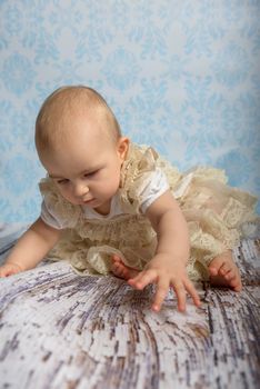 Portrait of adorable baby girl. Childhood.