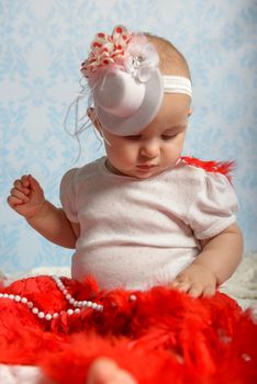 Portrait of adorable baby girl. Childhood.